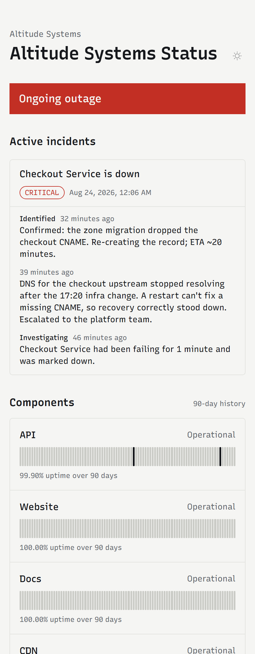A client's public status page on a phone during an outage: the ongoing disruption banner, the incident and the updates posted to it.